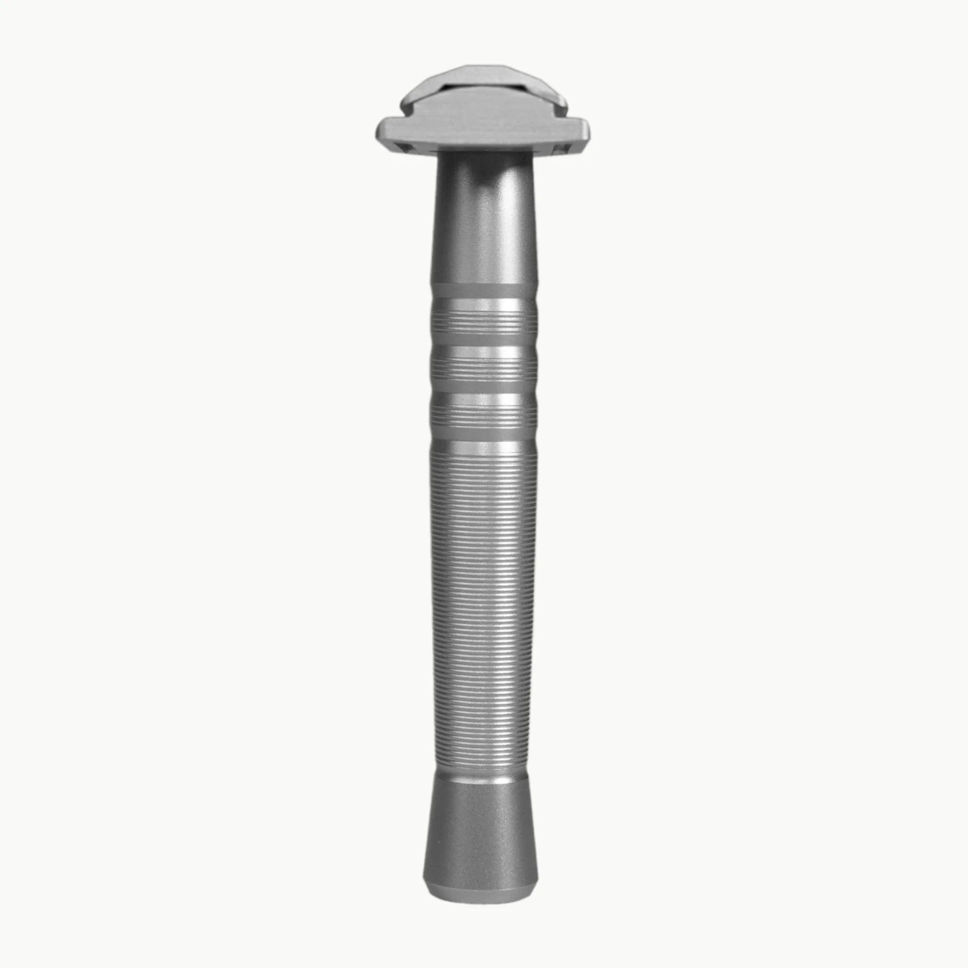 Silver safety razor on a white background