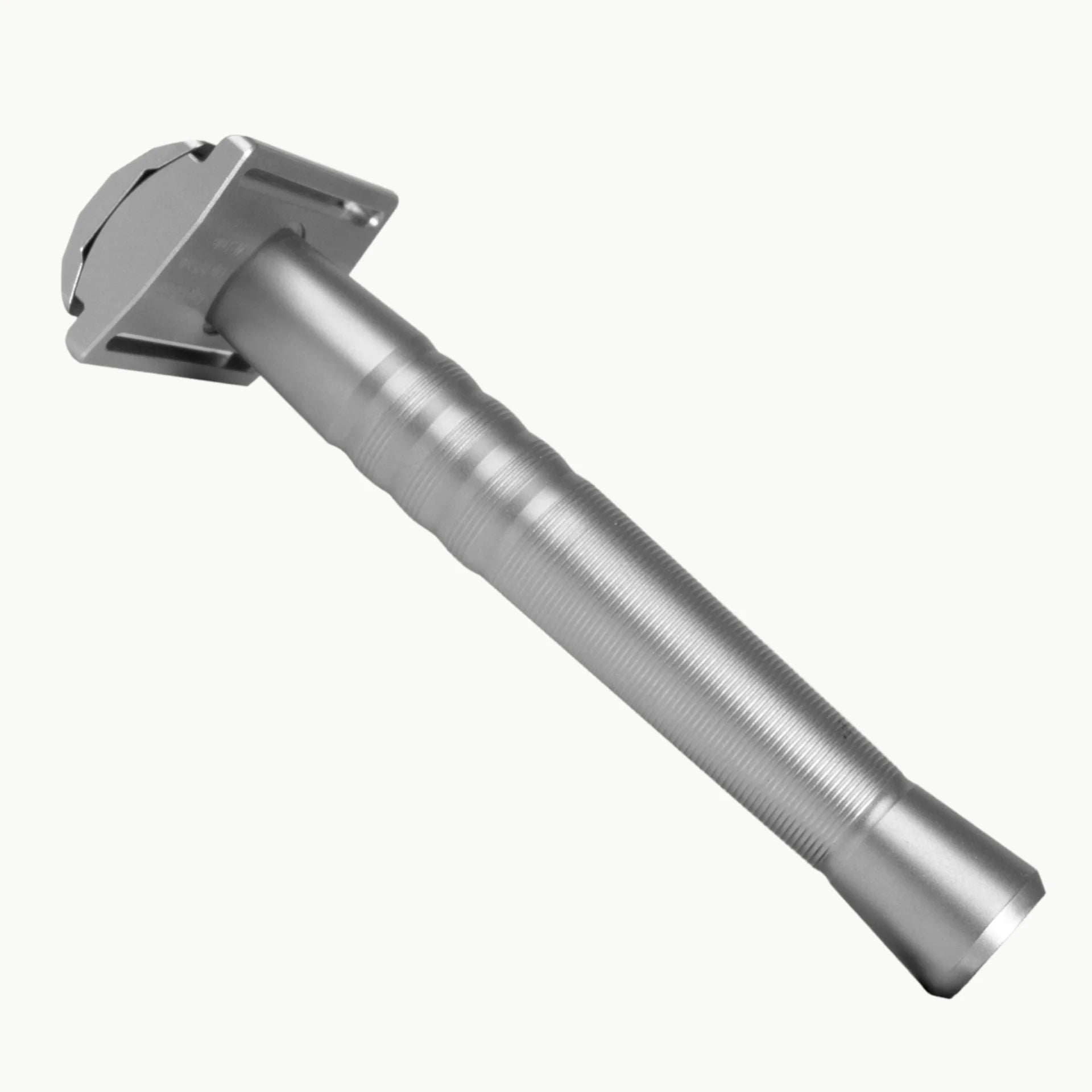 Silver safety razor on a white background