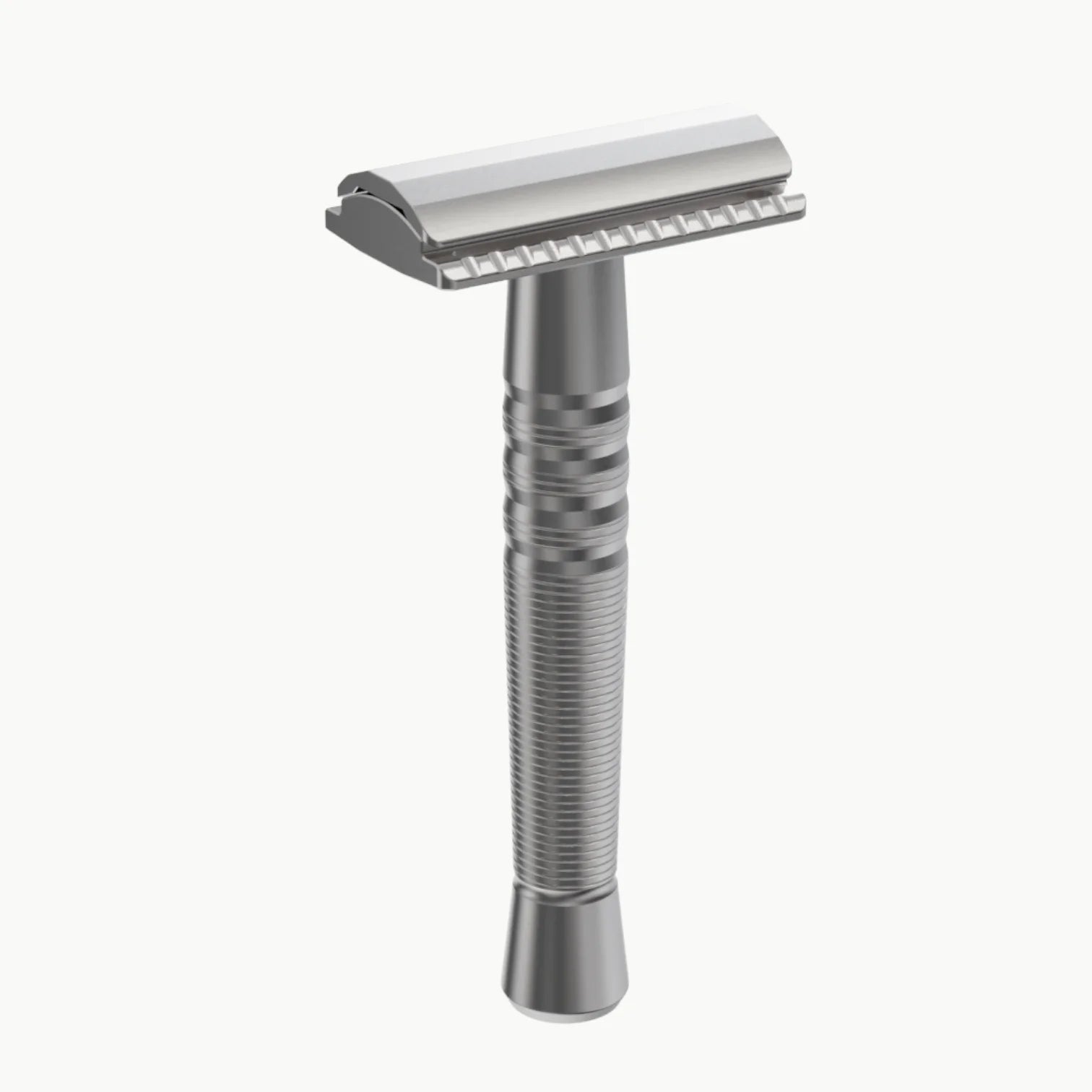 Silver safety razor on a white background